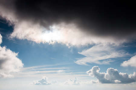 colorful dramatic sky with cloud at sunsetの写真素材
