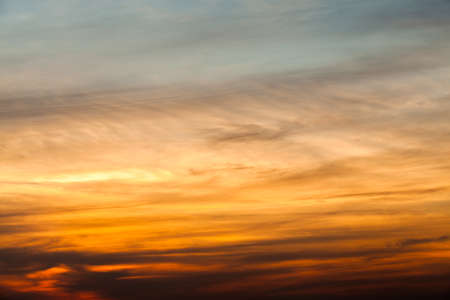 colorful dramatic sky with cloud at sunsetの写真素材