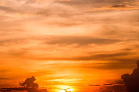 colorful dramatic sky with cloud at sunsetの写真素材