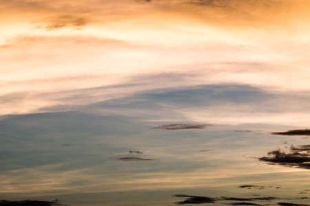 colorful dramatic sky with cloud at sunsetの写真素材