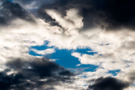 colorful dramatic sky with cloud at sunsetの写真素材