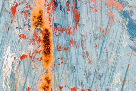 A background of peeling paint and rusty old metalの写真素材