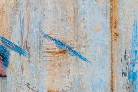 A background of peeling paint and rusty old metalの写真素材