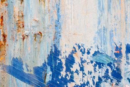 A background of peeling paint and rusty old metalの写真素材