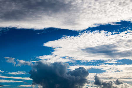colorful dramatic sky with cloud at sunsetの写真素材