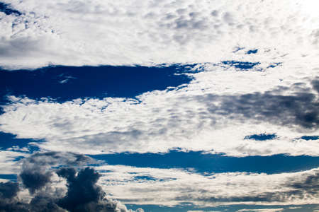 colorful dramatic sky with cloud at sunsetの写真素材