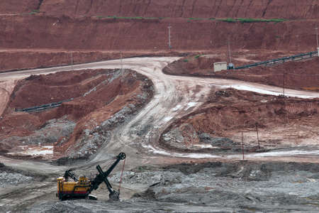 Part of a pit with big mining truck working