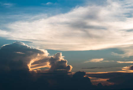 colorful dramatic sky with cloud at sunsetの写真素材