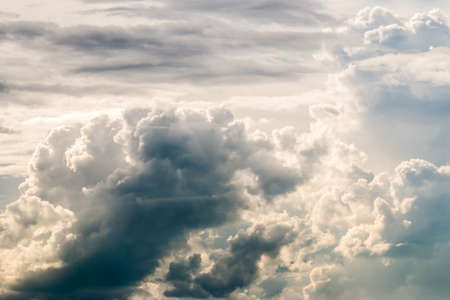 colorful dramatic sky with cloud at sunsetの写真素材