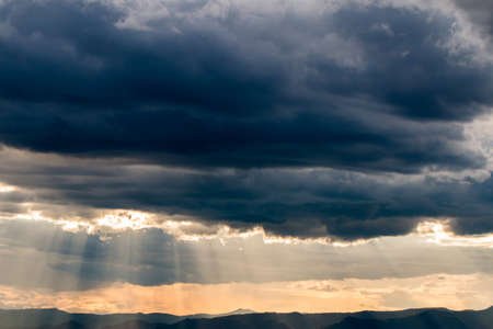 colorful dramatic sky with cloud at sunsetの写真素材