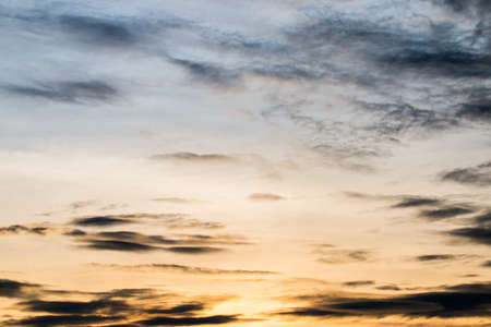 colorful dramatic sky with cloud at sunsetの写真素材