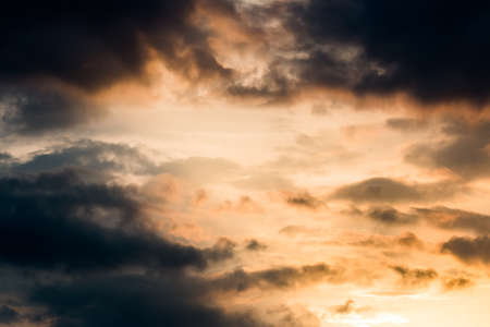 colorful dramatic sky with cloud at sunsetの写真素材