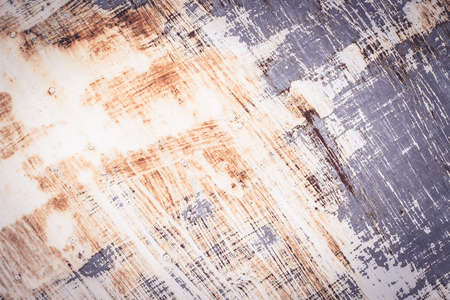 A background of peeling paint and rusty old metalの写真素材