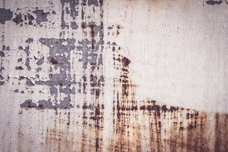 A background of peeling paint and rusty old metalの写真素材