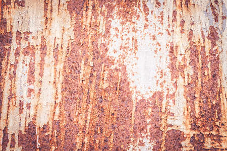 A background of peeling paint and rusty old metalの写真素材