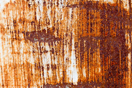 A background of peeling paint and rusty old metal