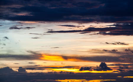 colorful dramatic sky with cloud at sunsetの写真素材