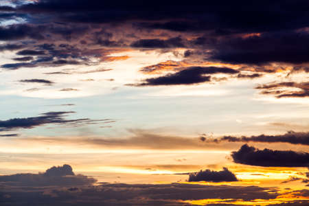colorful dramatic sky with cloud at sunsetの写真素材