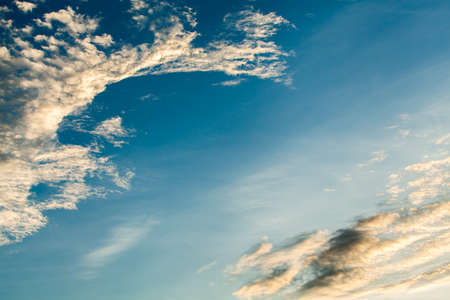 colorful dramatic sky with cloud at sunsetの写真素材