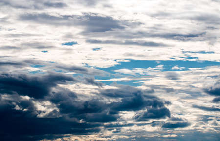 colorful dramatic sky with cloud at sunsetの写真素材
