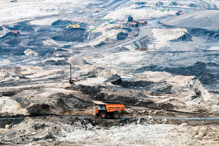 Part of a pit with big mining truck workingの写真素材