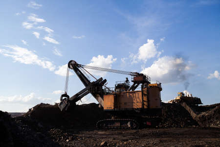 Part of a pit with big mining truck workingの写真素材