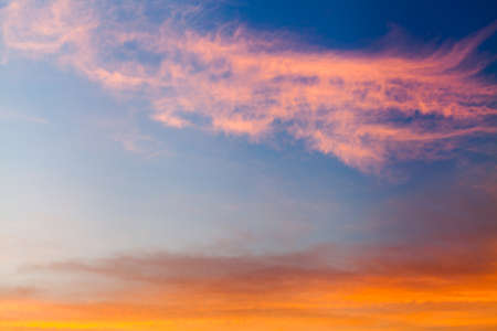 colorful dramatic sky with cloud at sunsetの写真素材