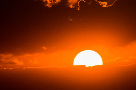 colorful dramatic sky with cloud at sunsetの写真素材