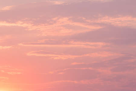 colorful dramatic sky with cloud at sunsetの写真素材