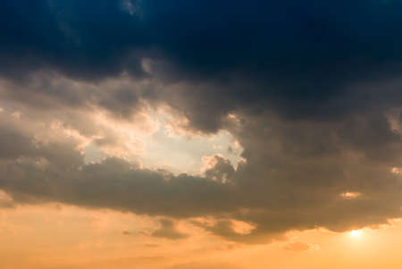 colorful dramatic sky with cloud at sunsetの写真素材