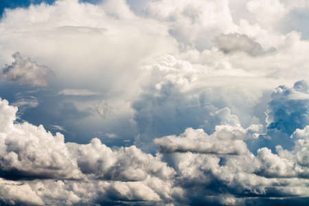colorful dramatic sky with cloud at sunsetの写真素材