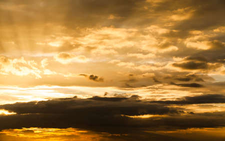 colorful dramatic sky with cloud at sunsetの写真素材