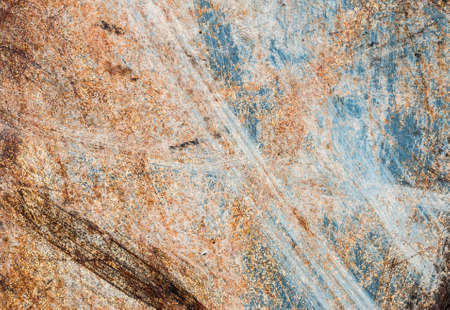 A background of peeling paint and rusty old metalの写真素材
