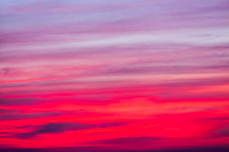 colorful dramatic sky with cloud at sunsetの写真素材