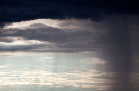 colorful dramatic sky with cloud at sunsetの写真素材