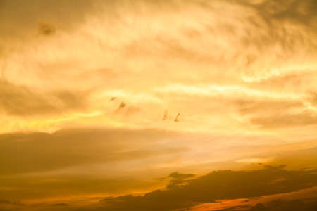 colorful dramatic sky with cloud at sunsetの写真素材