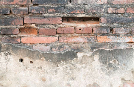 cracked concrete vintage brick wall backgroundの写真素材