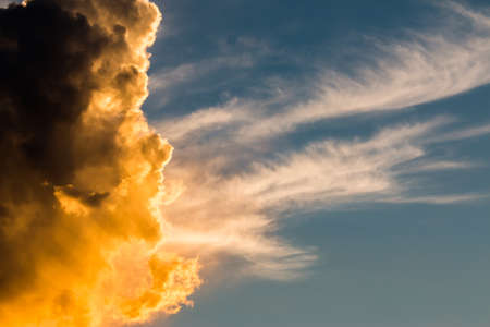 colorful dramatic sky with cloud at sunsetの写真素材