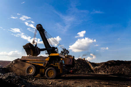 Part of a pit with big mining truck working
