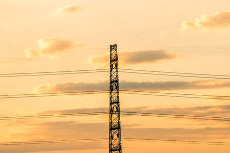 silhouette of high voltage electrical pole structureの写真素材