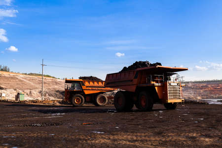 Part of a pit with big mining truck working