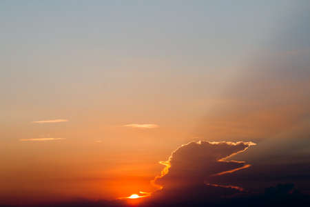colorful dramatic sky with cloud at sunsetの写真素材