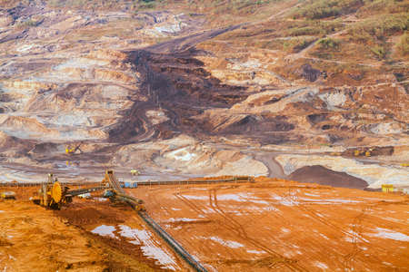 Part of a pit with big mining truck working