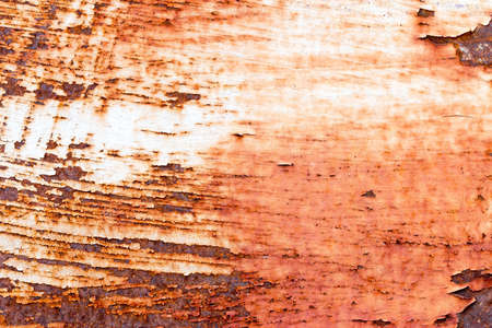 A background of peeling paint and rusty old metalの写真素材