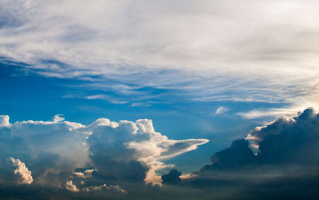 colorful dramatic sky with cloud at sunsetの写真素材