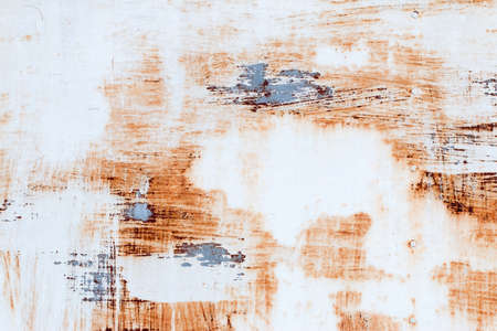 A background of peeling paint and rusty old metalの写真素材