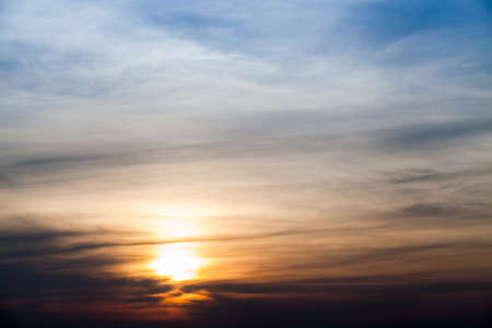 colorful dramatic sky with cloud at sunsetの写真素材