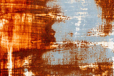 A background of peeling paint and rusty old metalの写真素材