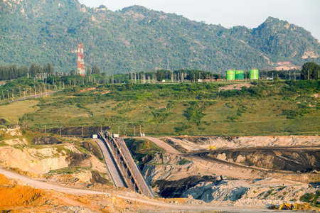 Part of a pit with big mining truck working