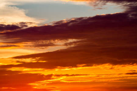 colorful dramatic sky with cloud at sunsetの写真素材